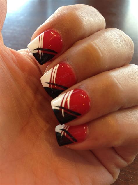 Acrylic red and black nail designs - Apr 18, 2023 · For a seductive finish, wear your favorite shade of red lipstick to compliment your manicure. 3. Pink And White Stiletto Nails. Pink and white is a combination that is timeless and classic. This is one of the most feminine pairings, and it looks great on nails of all shapes and lengths. 